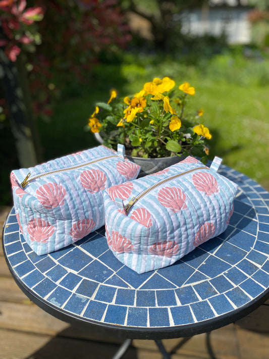 Seashells and stripes wash bag