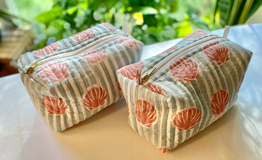 Seashells and stripes wash bag